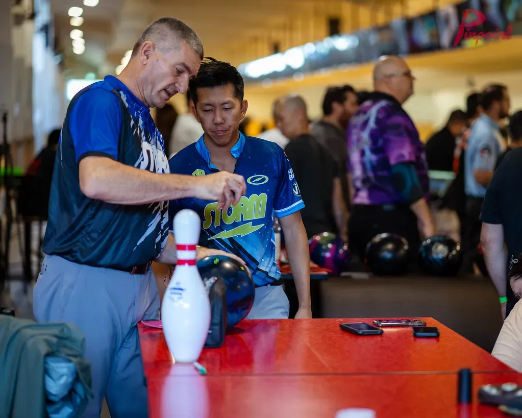 Darren Tang coaching a bowler at the 2024 clinic