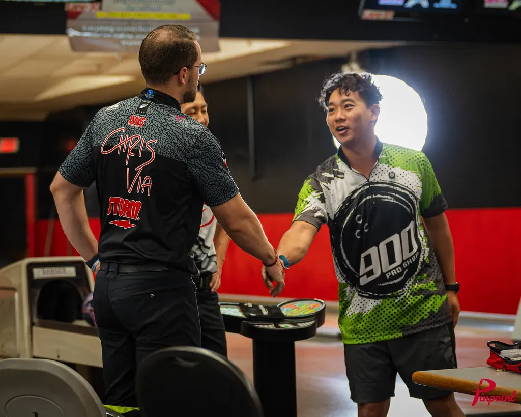Chris Via greeting a bowler at The Toronto Experience